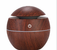 MistAura Aroma Diffuser – Compact USB humidifier with wooden design for home and office use.
