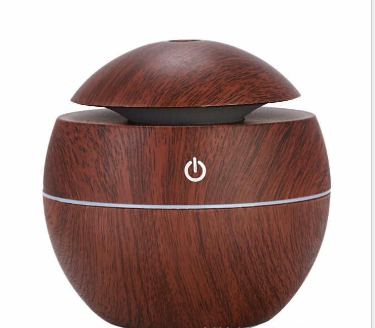 MistAura Aroma Diffuser – Compact USB humidifier with wooden design for home and office use.