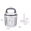 KitchenPro Food Chopper in use with chopped vegetables and herbs on wooden countertop.
