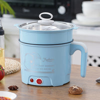 QuickCook Noodle Pot in blue color with transparent lid on countertop, ideal for fast meal preparation.