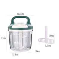 KitchenPro Food Chopper in use with chopped vegetables and herbs on wooden countertop.