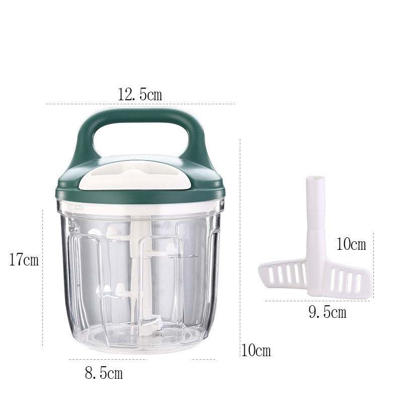 KitchenPro Food Chopper in use with chopped vegetables and herbs on wooden countertop.